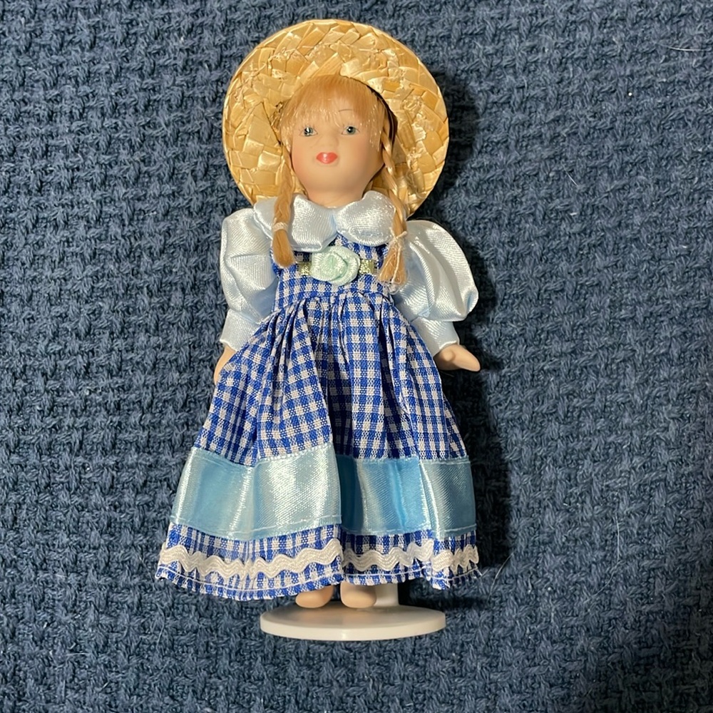 Mini porcelain doll